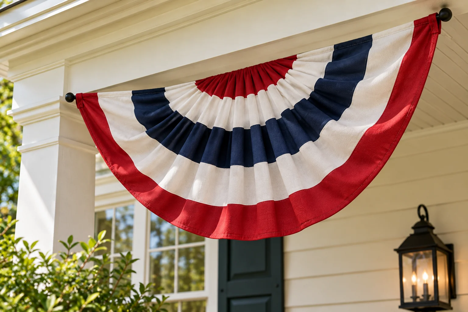 Close view of pleated red, ivory and navy fabric bunting.